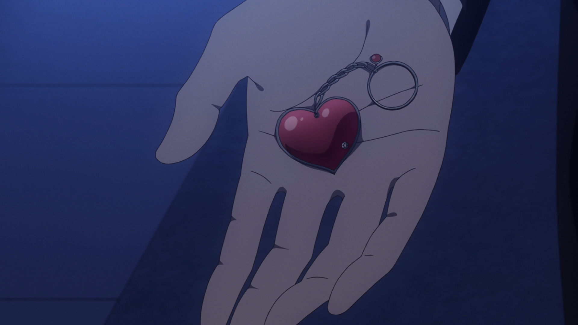 Captura de tela do episódio 13 da terceira temporada de "Kaguya-sama: Love is War", mostrando um chaveiro de coração